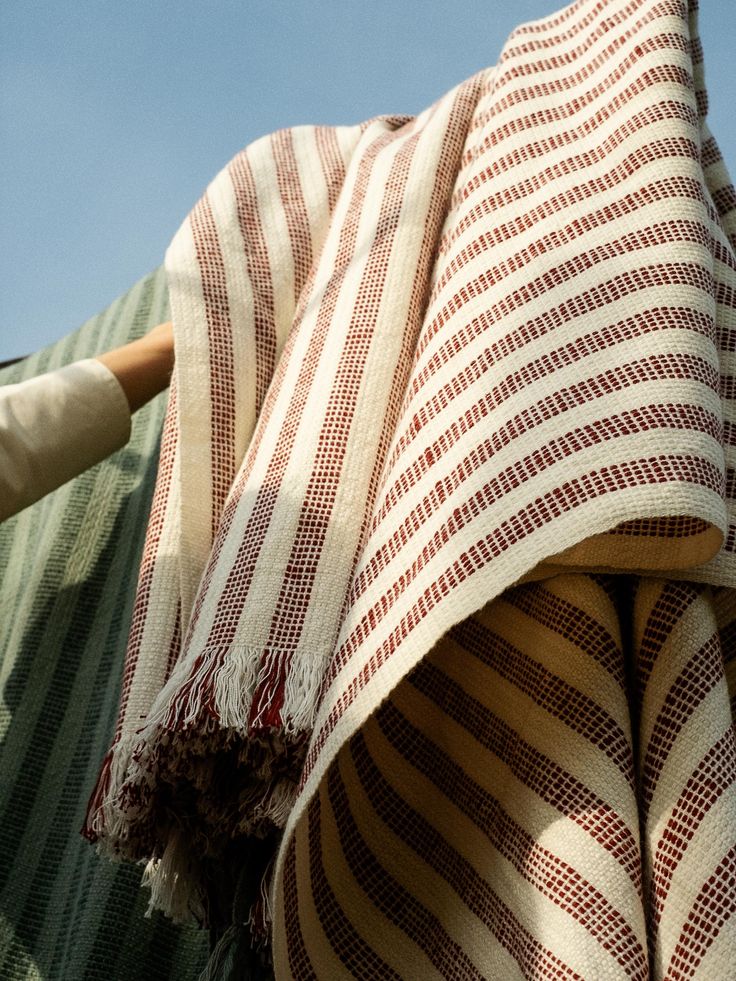 Cozy blankets styled in a warm and comfortable home